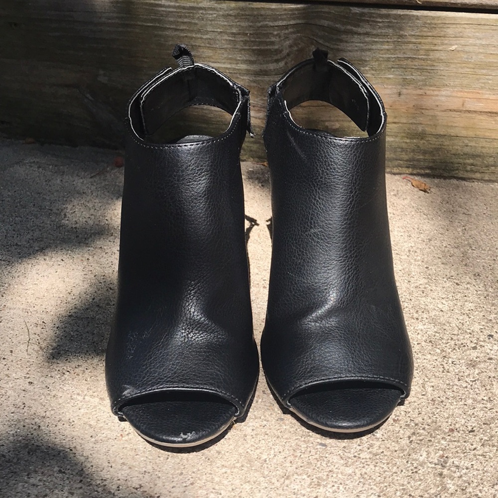 Black heeled open toe booties